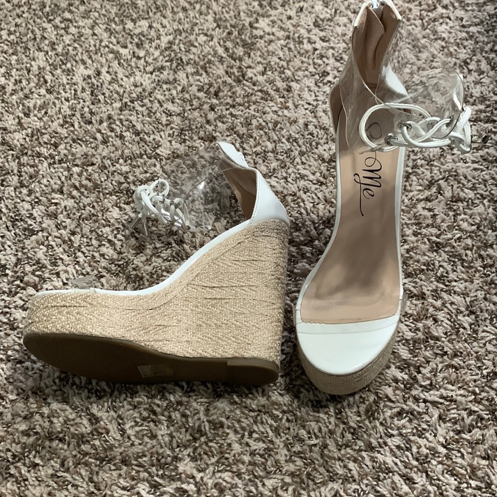 Used So Me high white and clear wedges.